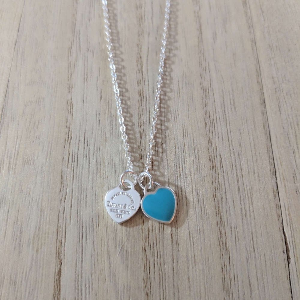 Sterling silver heart necklace.